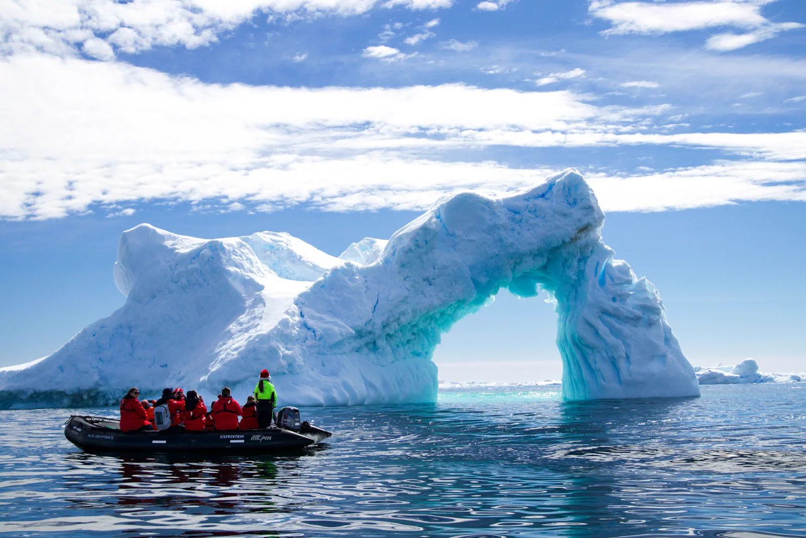 A polar expedition ship among icebergs