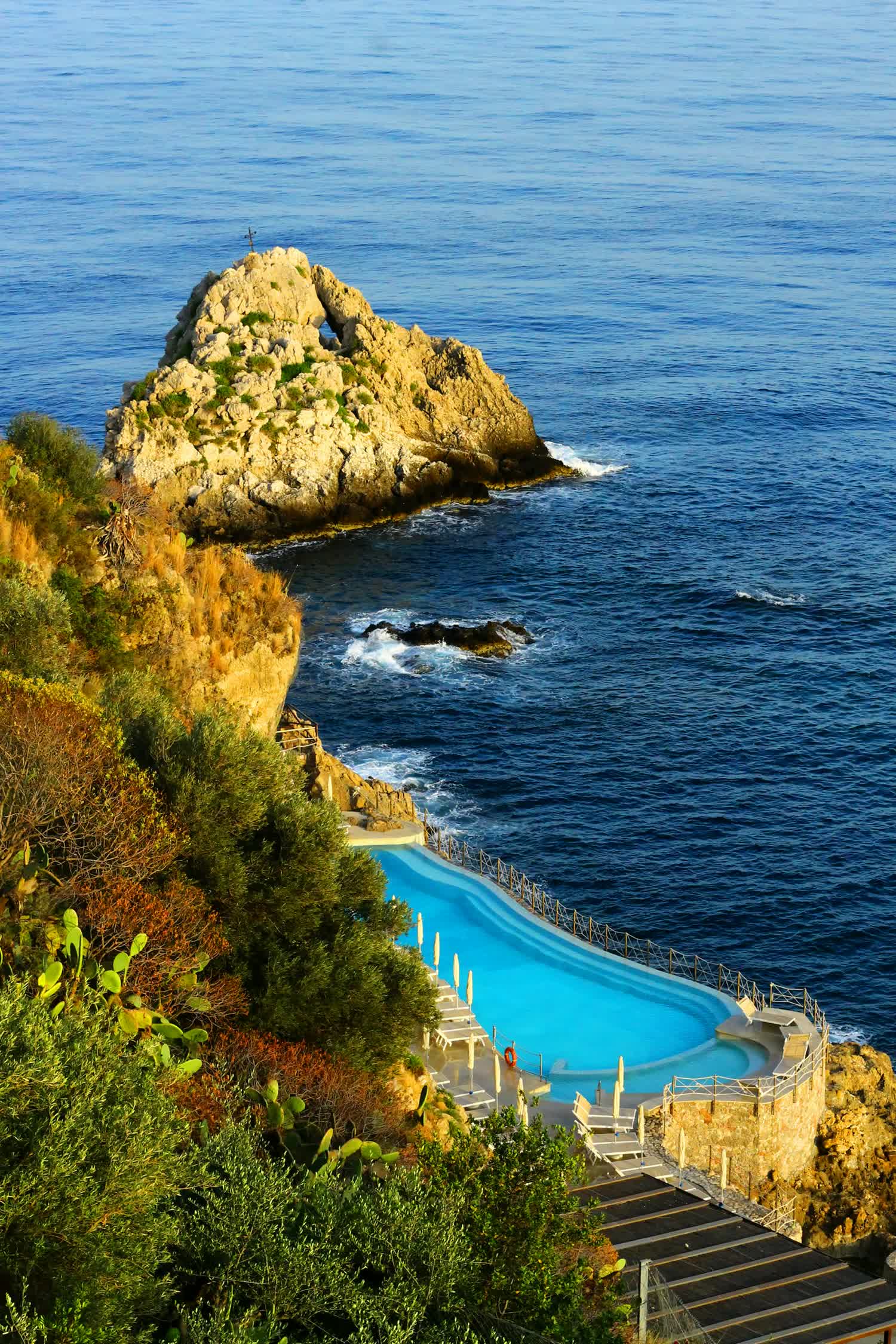 A private villa with an infinity pool overlooking the sea