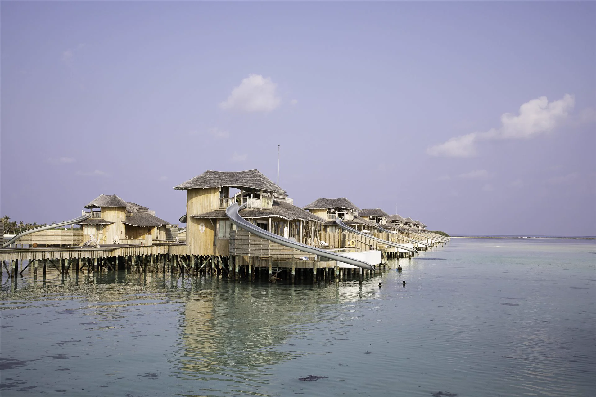 Overwater bungalows in the Maldives, luxury honeymoon travel by StoryTailor